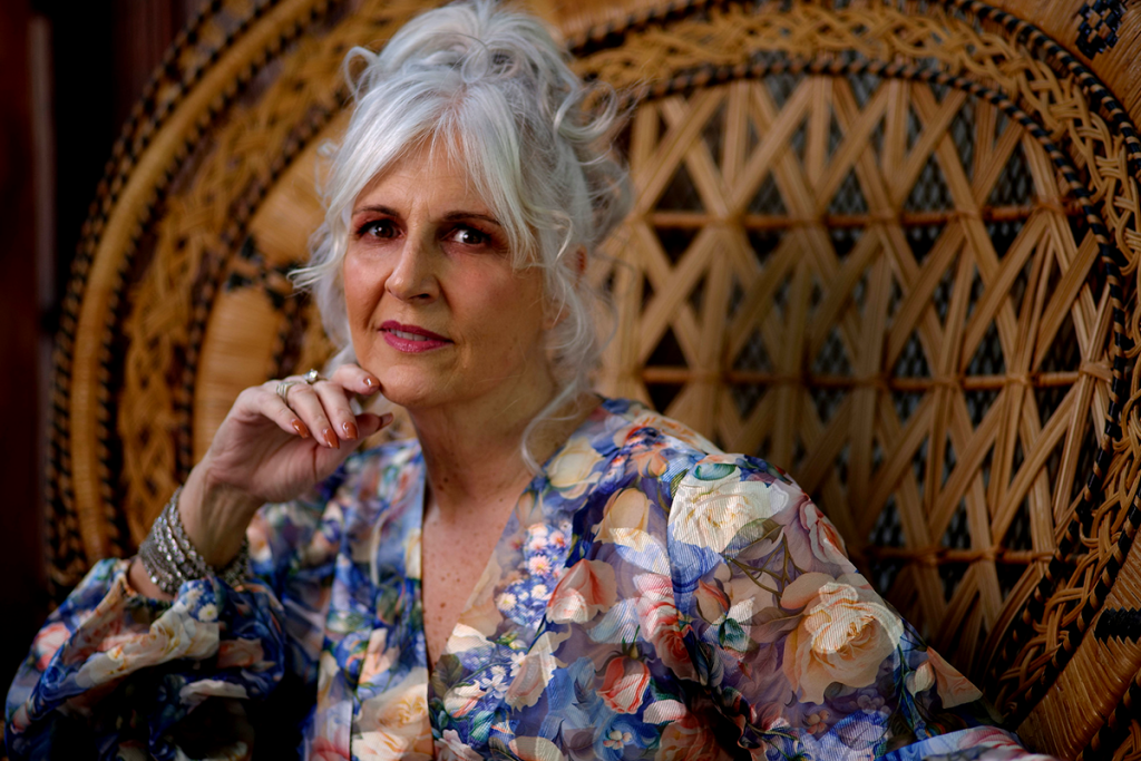 Portrait photography. Mature woman with gray hair.